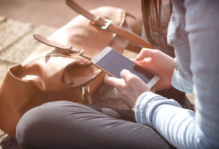 photo of a nurse practitioner using a smartphone