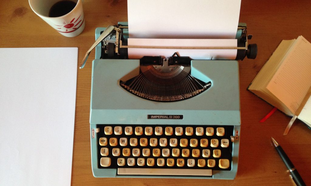 Photo of nurse practitioner writing a book