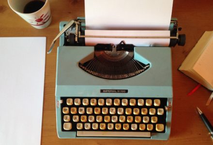 Photo of nurse practitioner writing a book