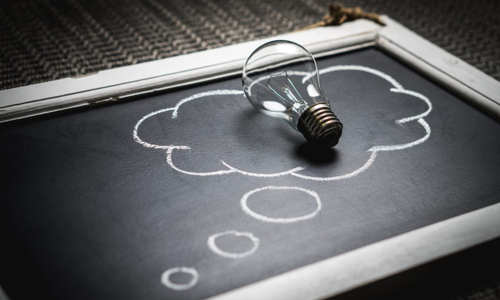 Photo of a lightbulb on a chalkboard