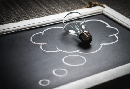 Photo of a lightbulb on a chalkboard