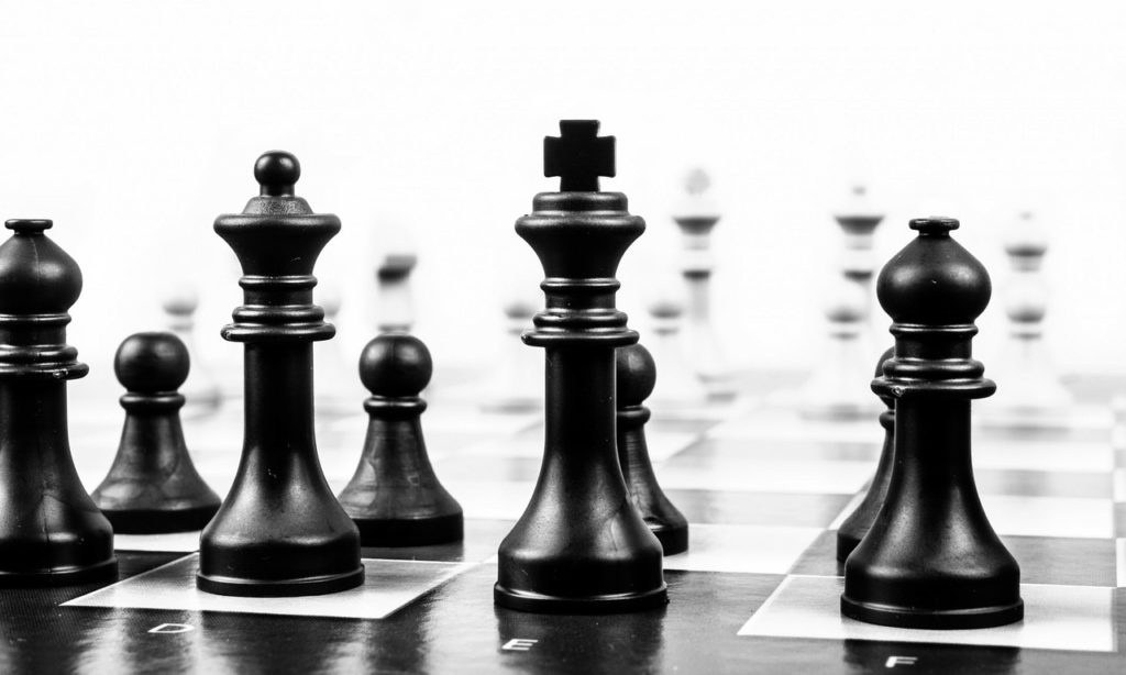 Closeup black and white photo of a chess board