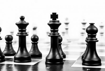 Closeup black and white photo of a chess board