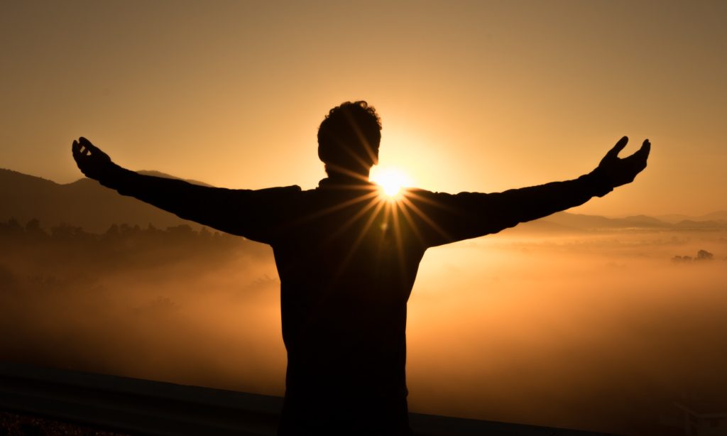 photo of a nurse practitioner watching a sunrise