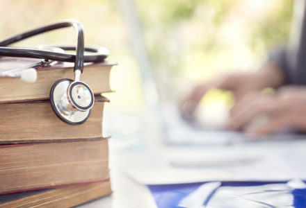 Stack of Nurse Practitioner Guideline Books